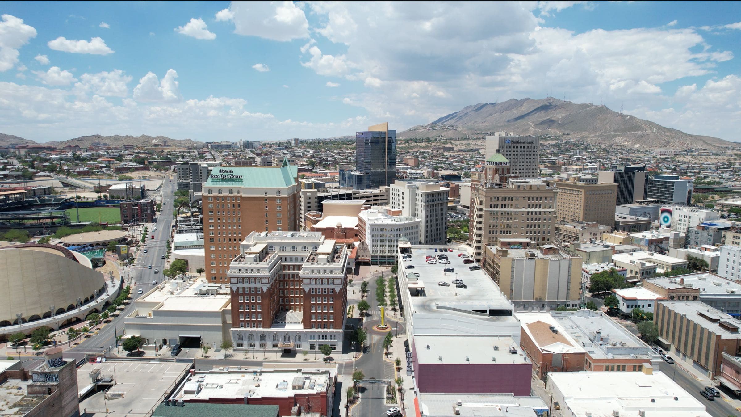 Aerial view of downtown El Paso with Southwest University Park and the Franklin Mountains