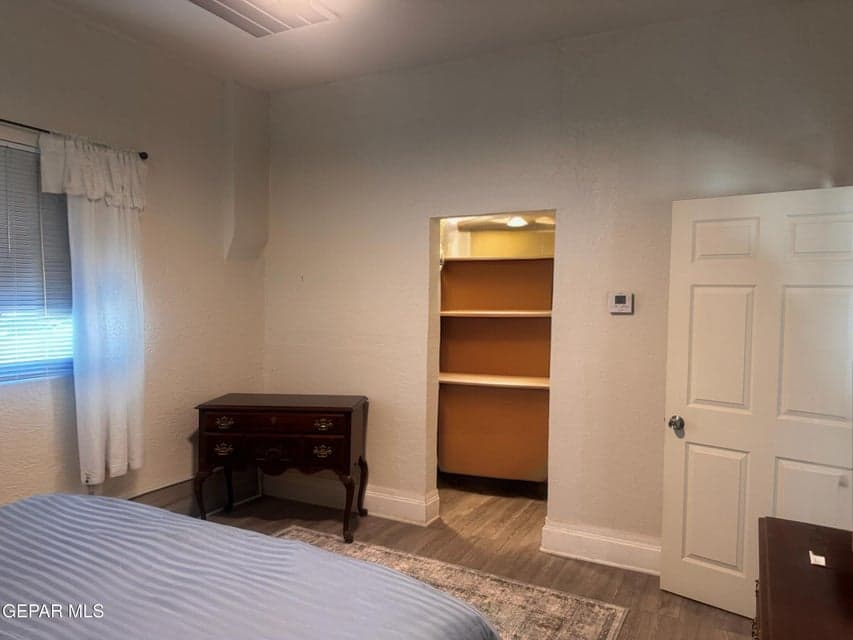 with walkin closet and bathroom