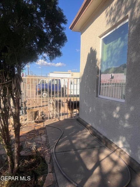 Fencing seperates yard from front Yard