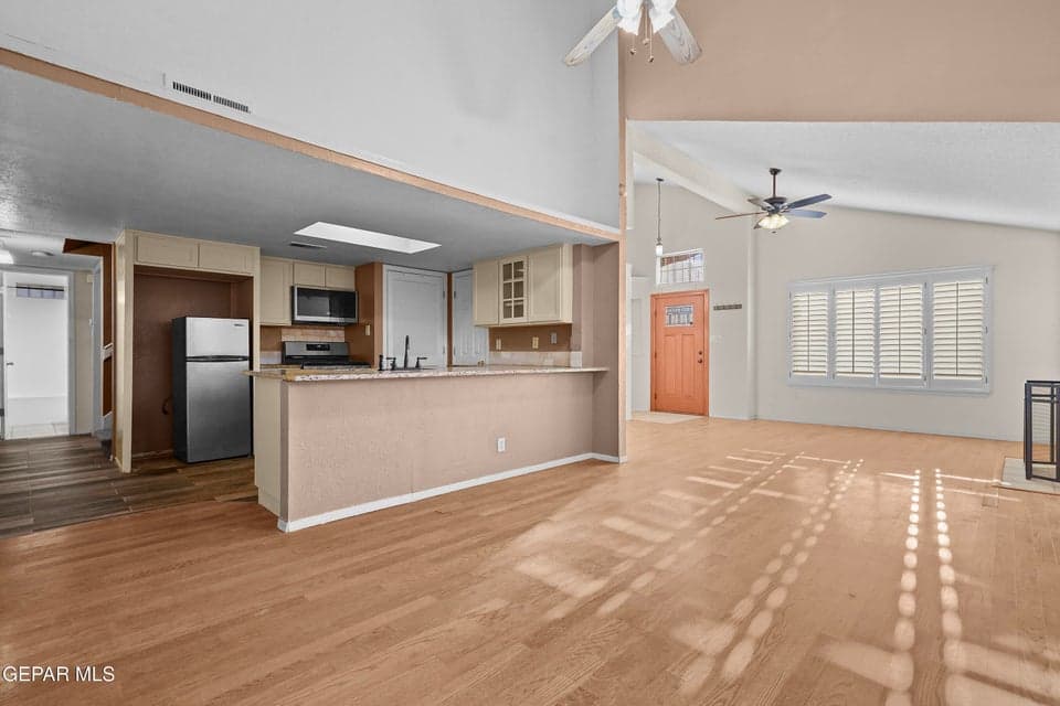 Natural light helps create a welcoming atmosphere. It’s a functional and inviting space.