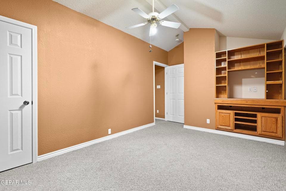 The den offers a versatile secondary living space perfect for relaxing, working, or entertaining. Its flexible layout allows it to function as a media room, home office, or playroom.