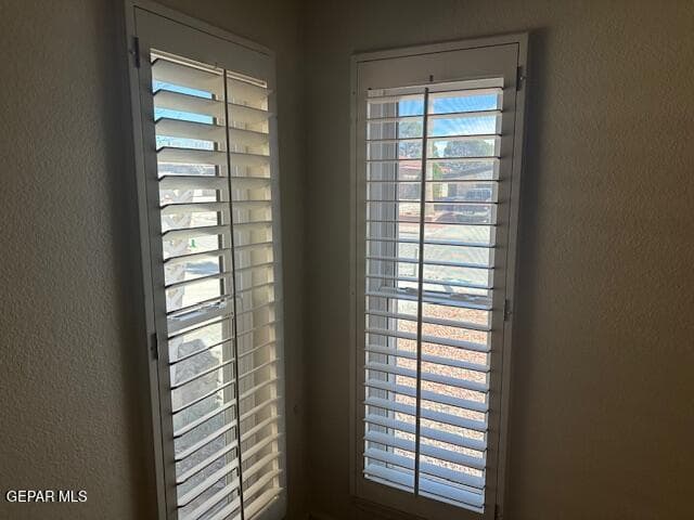 WOOD SHUTTERS IN MASTER BEDROOM WINDOWS
