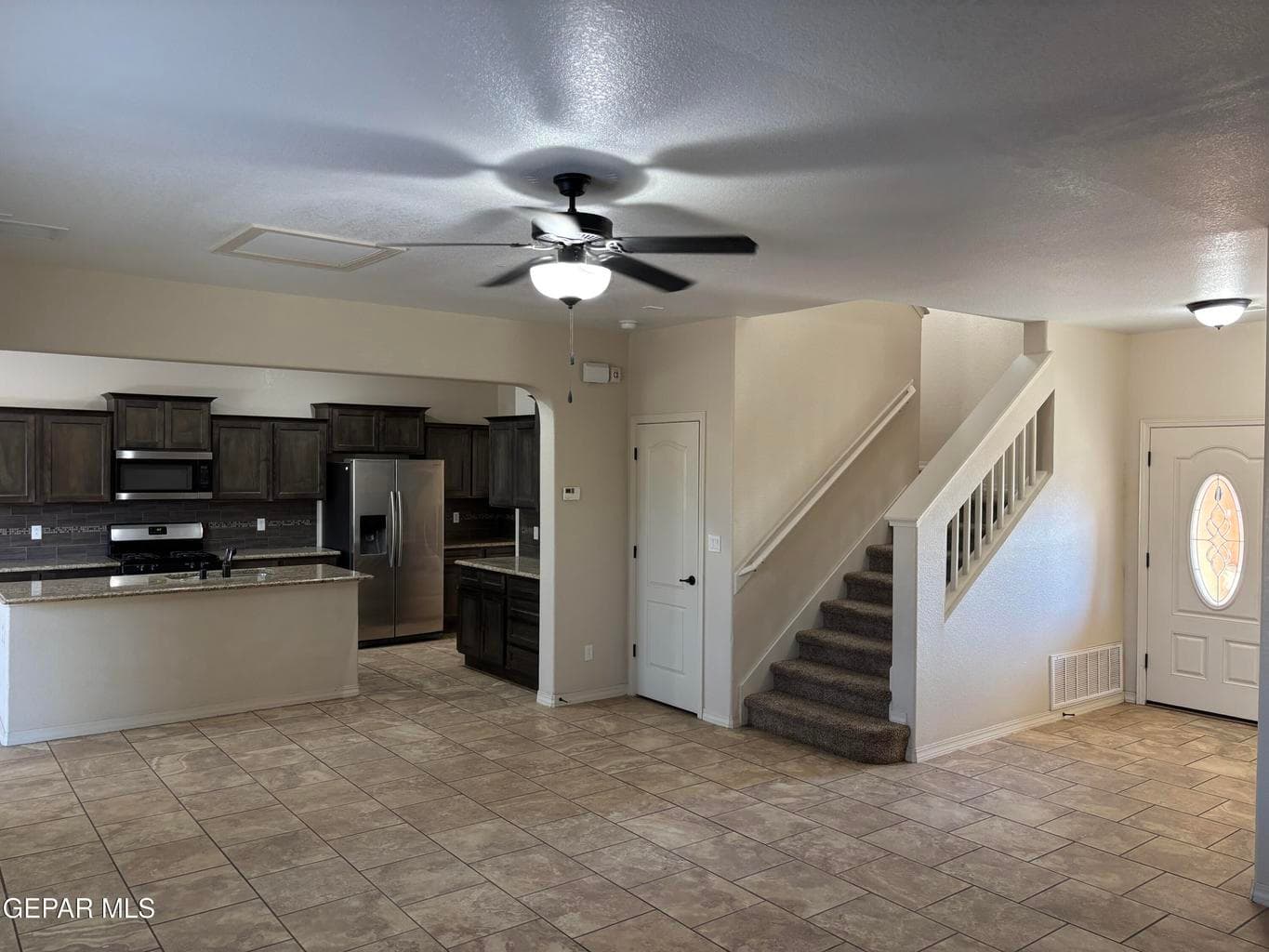 Great room open to kitchen and dining