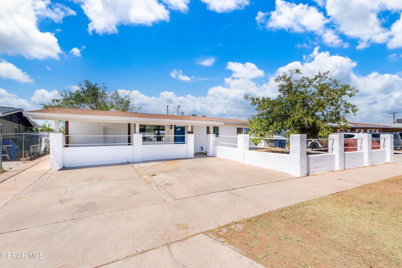 Plenty of Parking space and private front yard for kids or pets to play in!