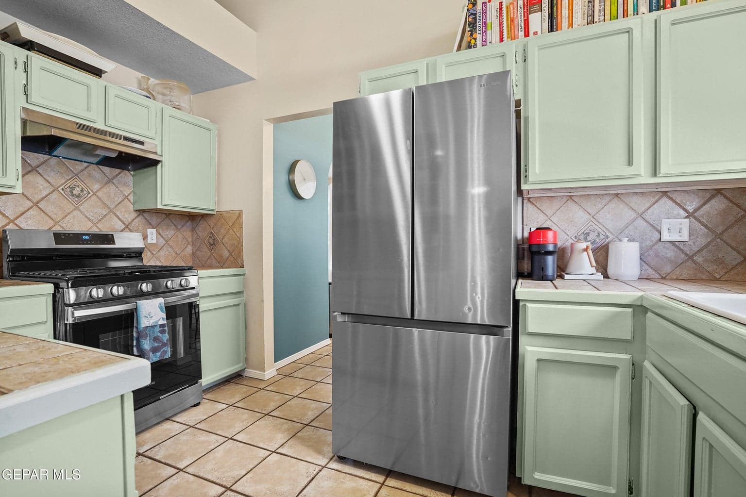 The kitchen provides practical workspace for cooking and meal preparation.