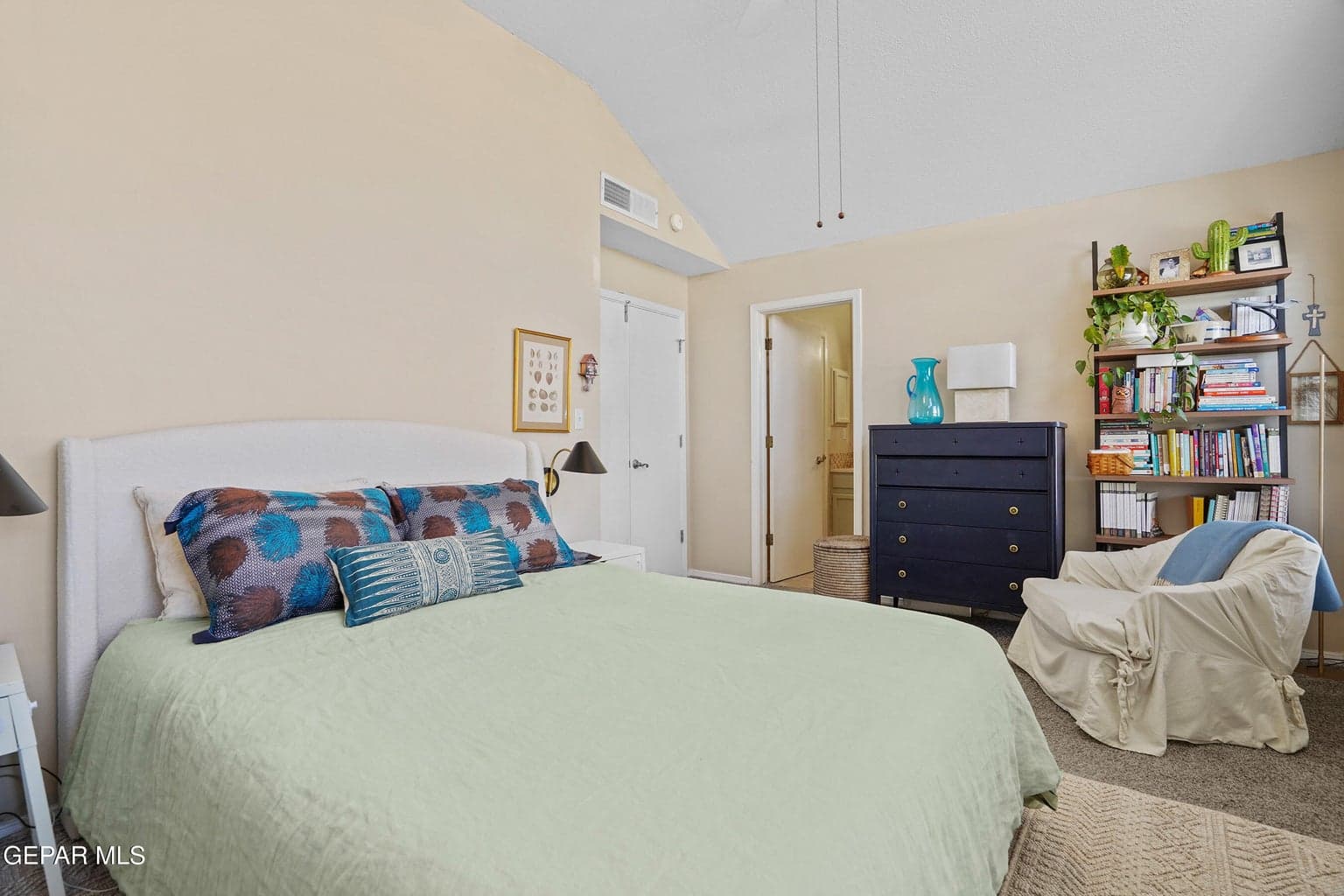 Spacious primary bedroom offering a relaxing retreat.