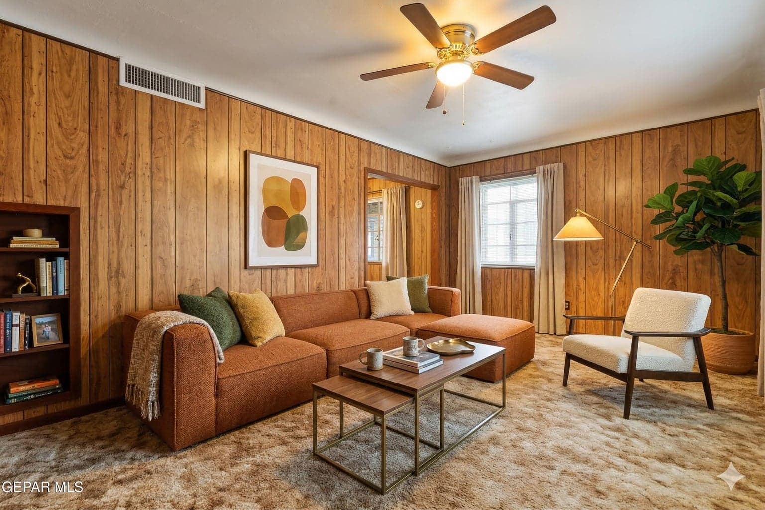 The living room provides a warm and inviting gathering space with a comfortable layout ideal for relaxing or hosting guests.
