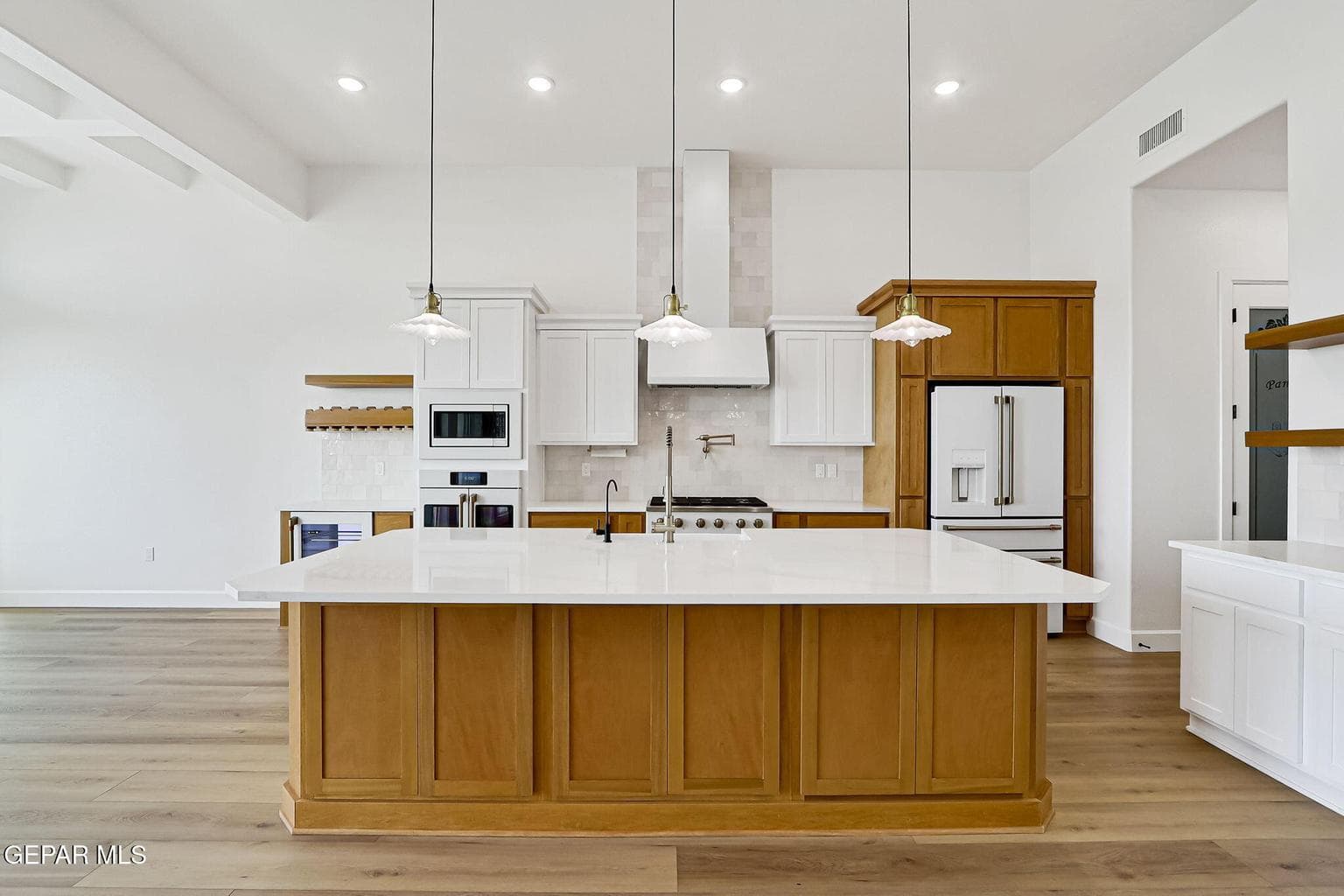 Open-concept layout, stainless steel appliances