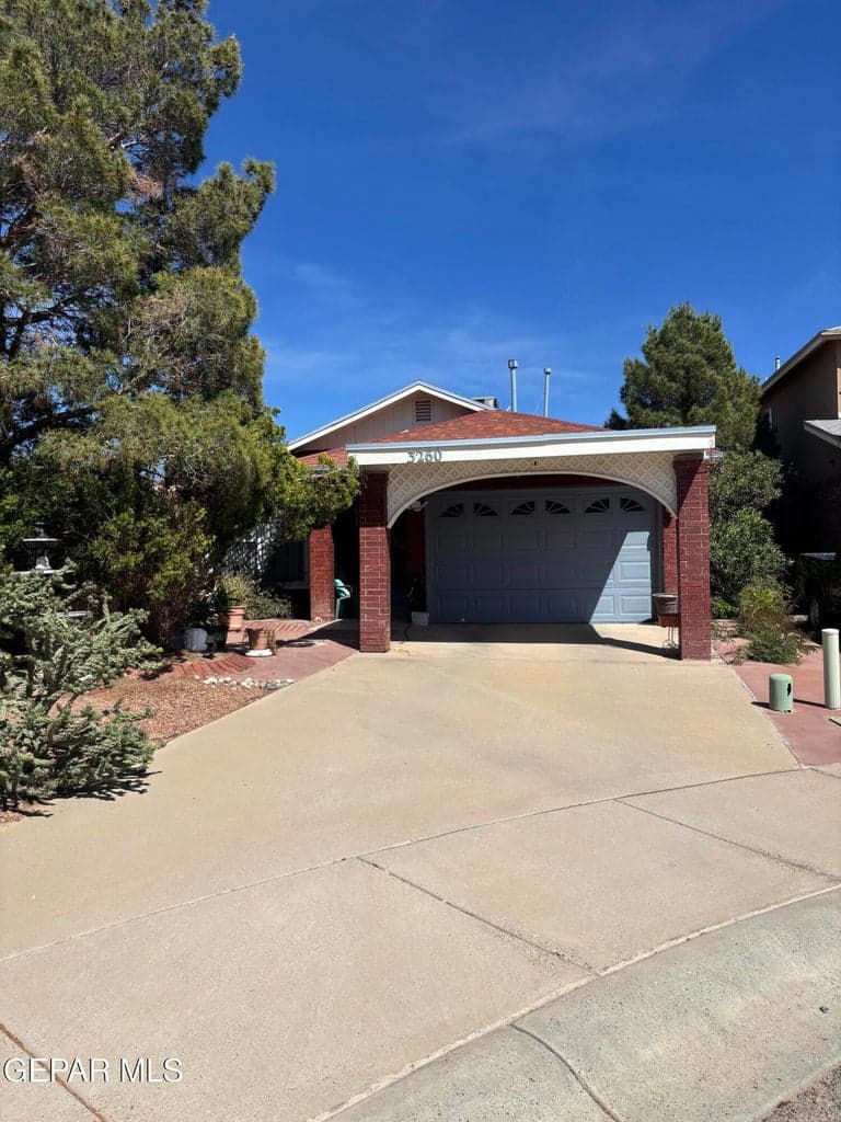 Carport in front of garage