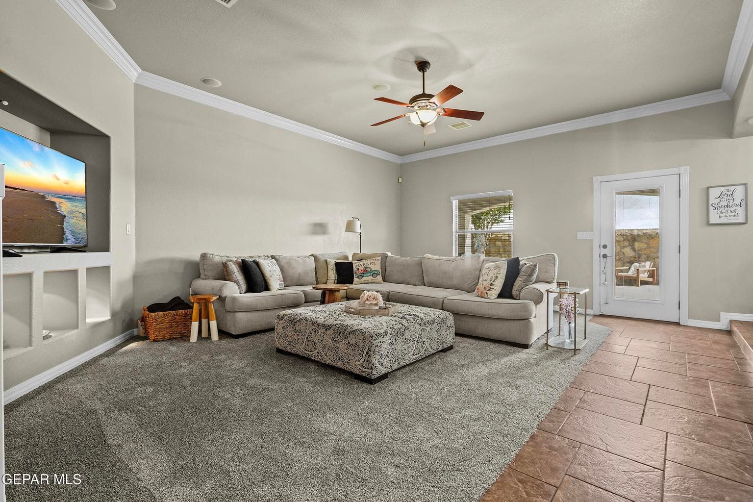 Large family room, tile and carpet flooring