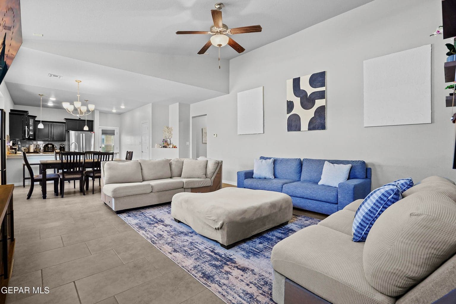 Tile flooring throughout, elevated ceiling height, ceiling fan for comfort