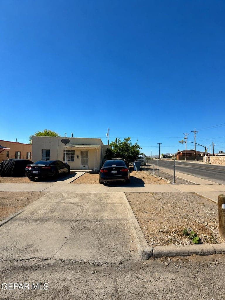 Front elevation with lots of parking space