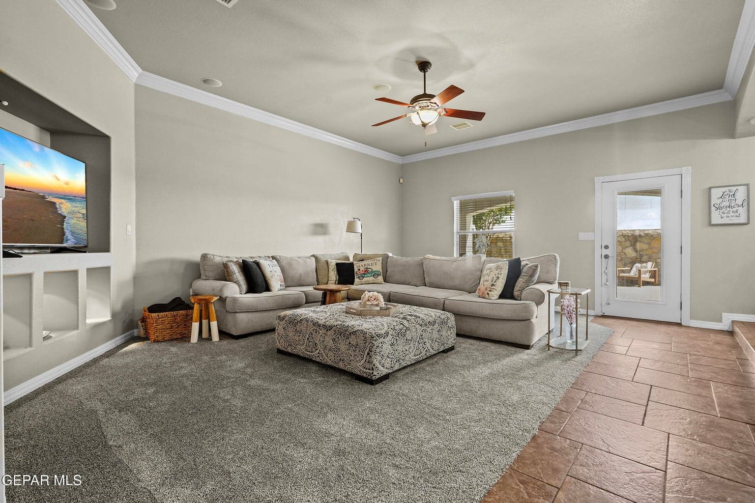 Large family room, tile and carpet flooring