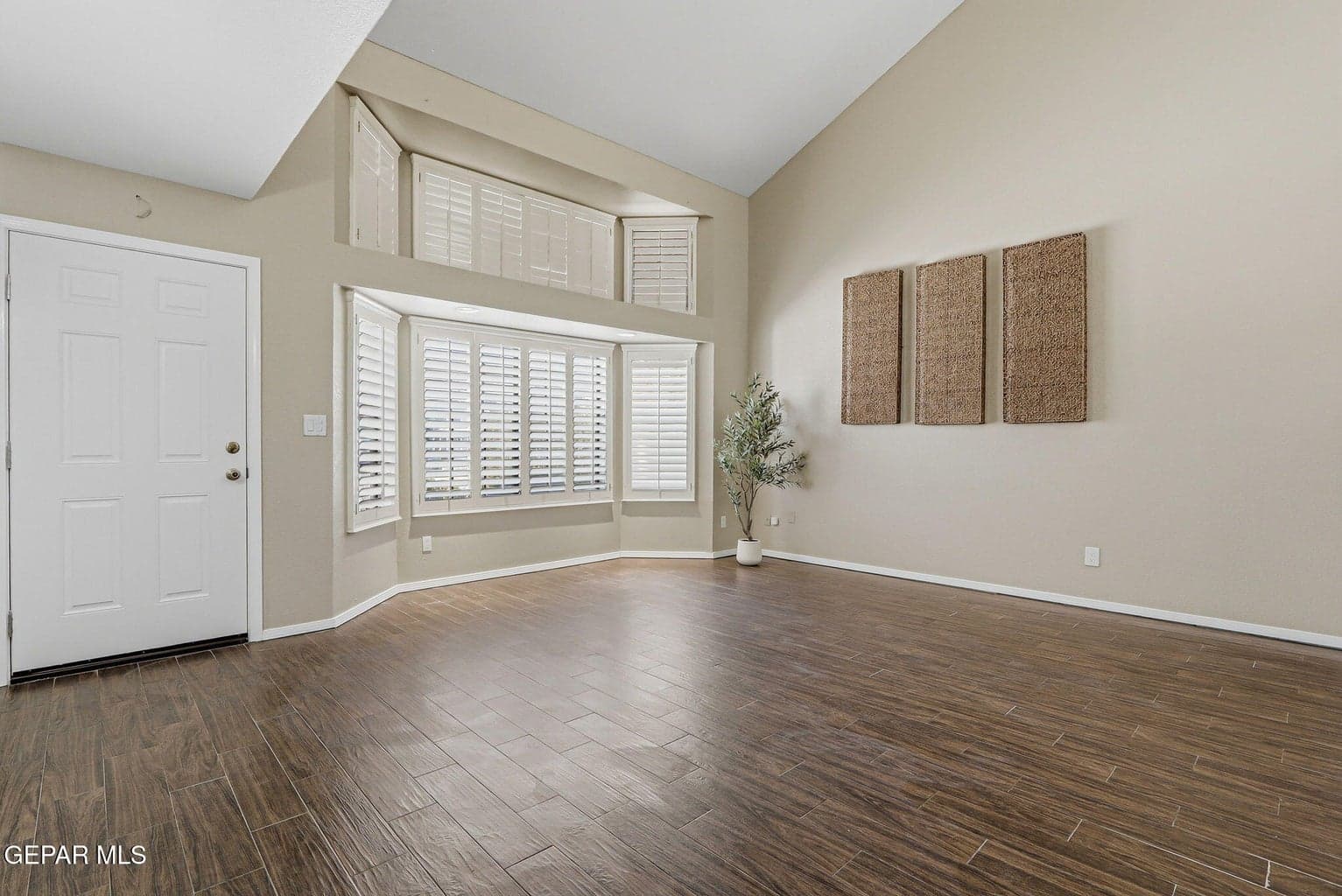 Another view of 1st Living room with plenty of natural light