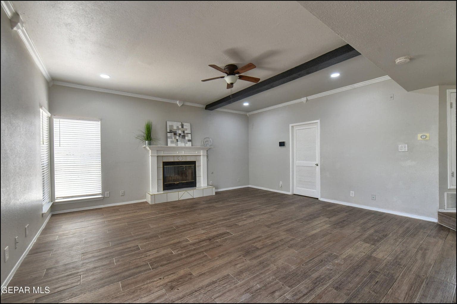 Family room- Door on rt wall goes to laundry rm, half bath and garage (conv)
