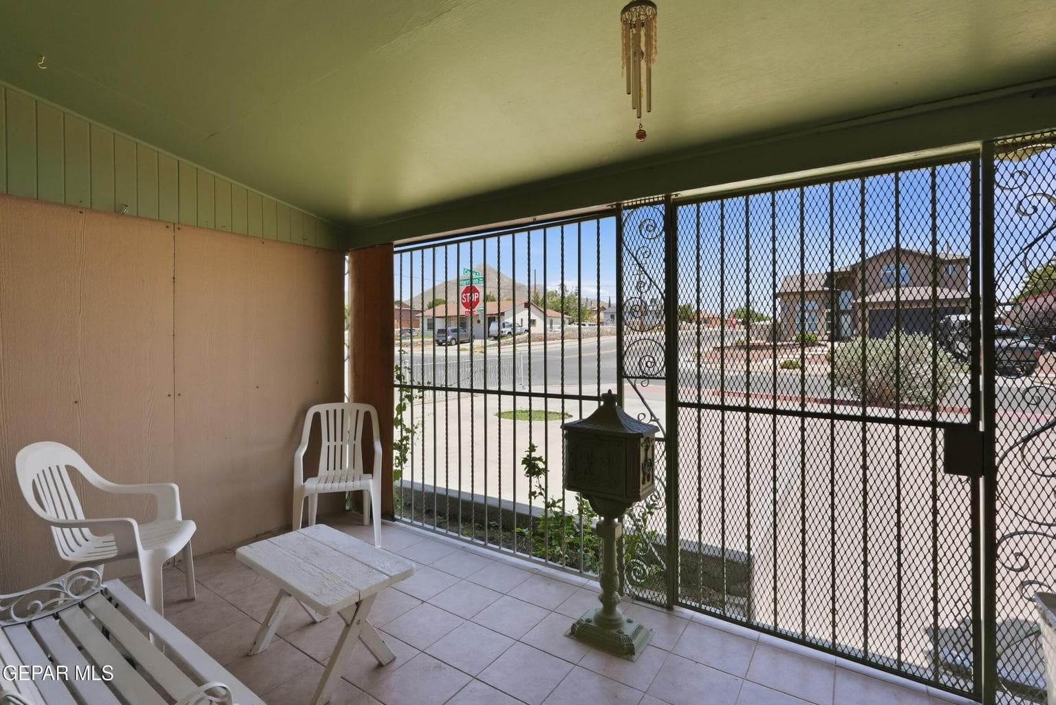 Covered porch welcoming you into Main home