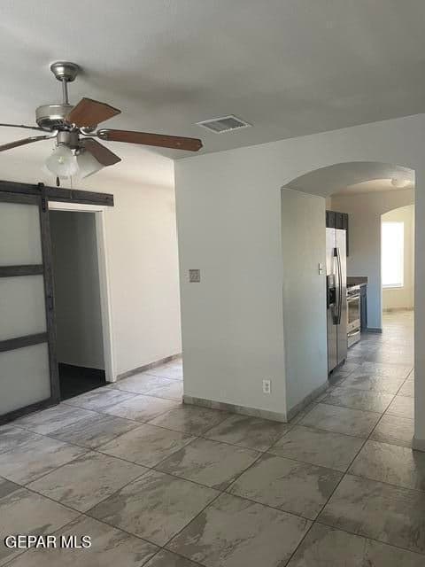 view of living room, kitchen and entry hall