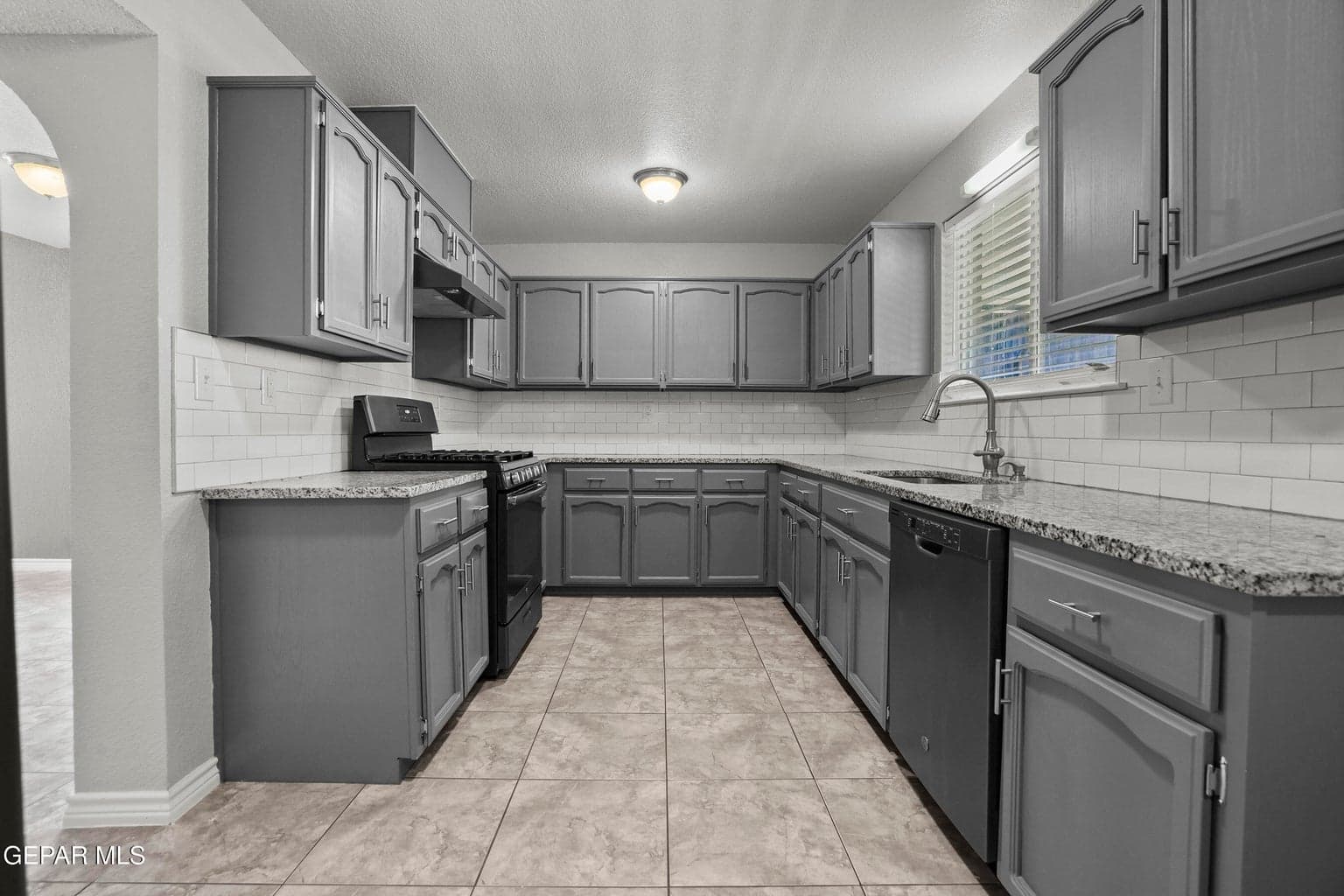 Offers granite countertops and ample cabinetry