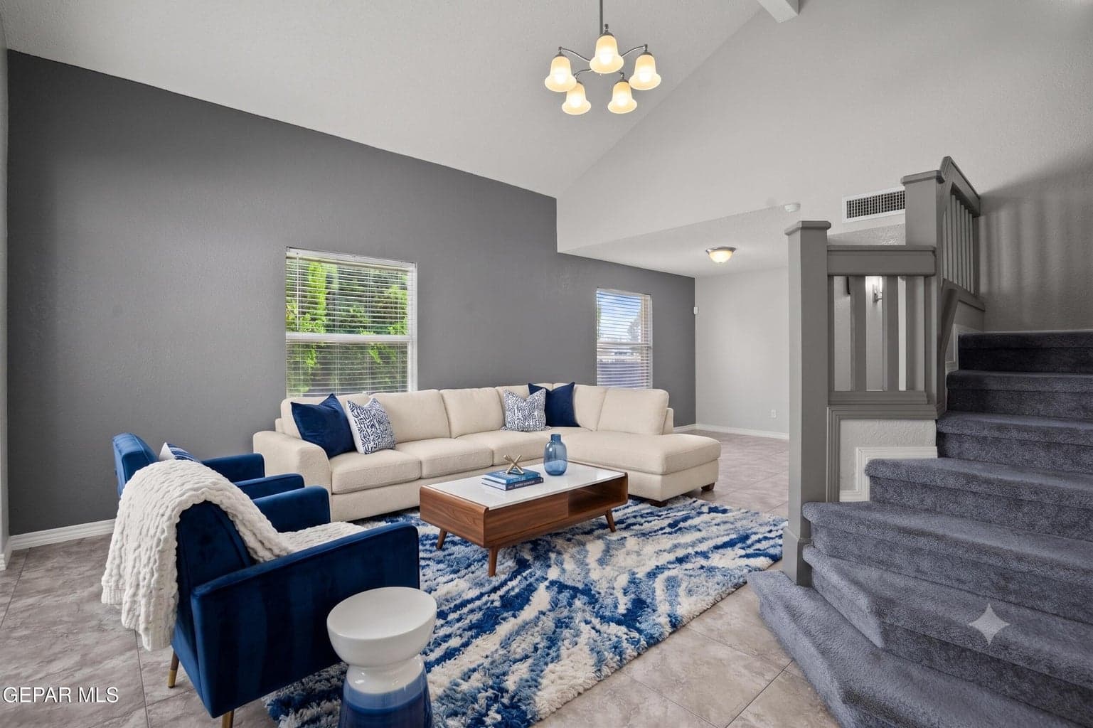 Features high ceilings and tile flooring,