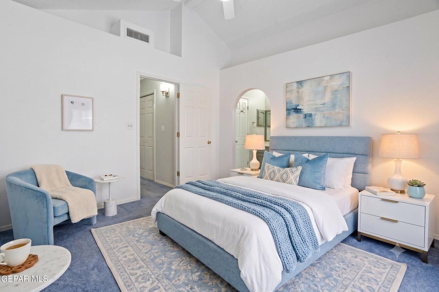 Spacious primary suite with private balcony access