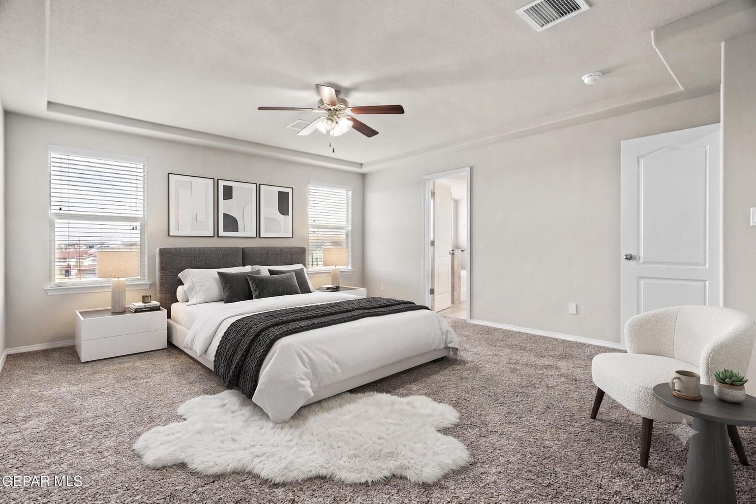 Unwind in the generous primary suite