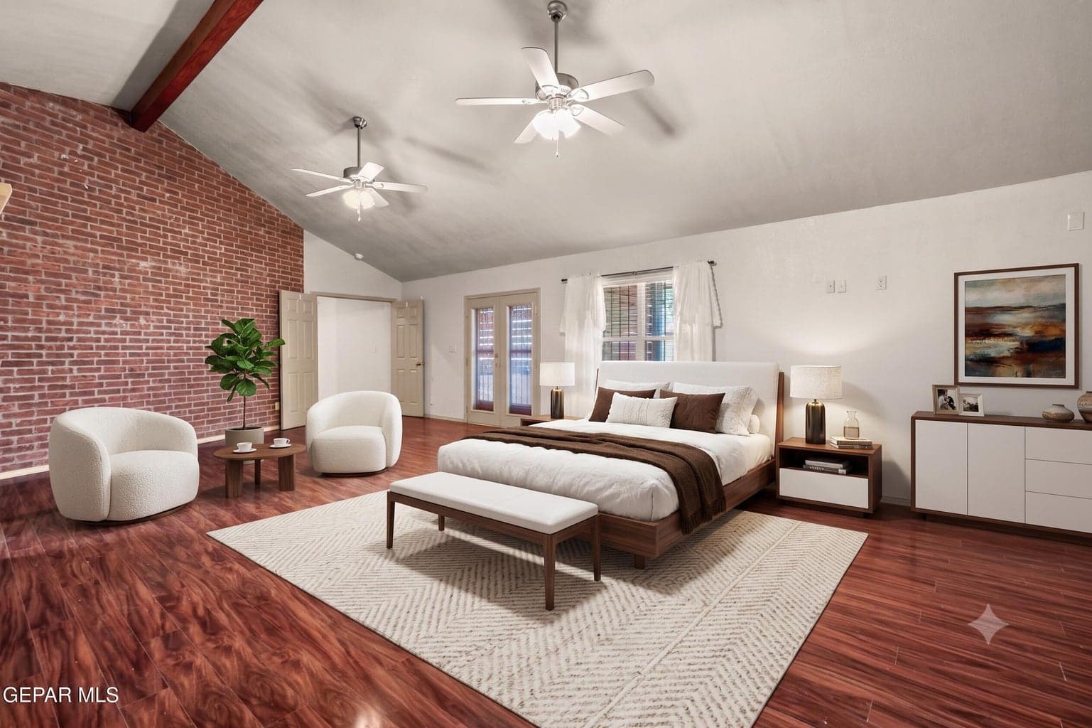 Features soaring ceilings, large windows, a ceiling fan, and enough space to accommodate two to three beds