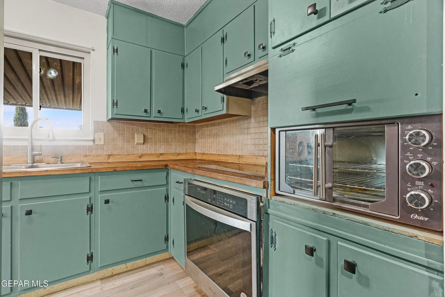 Offers ample cabinetry and generous meal prep space
