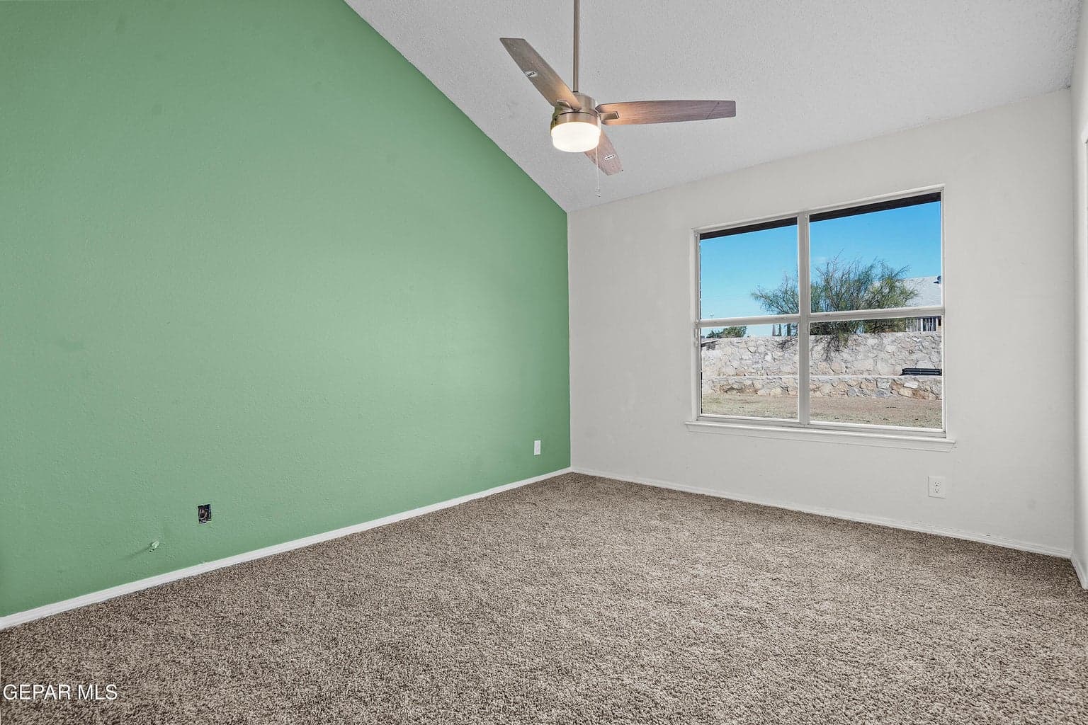 This Primary offers a cozy and welcoming atmosphere with soft natural light and a comfortable layout.
