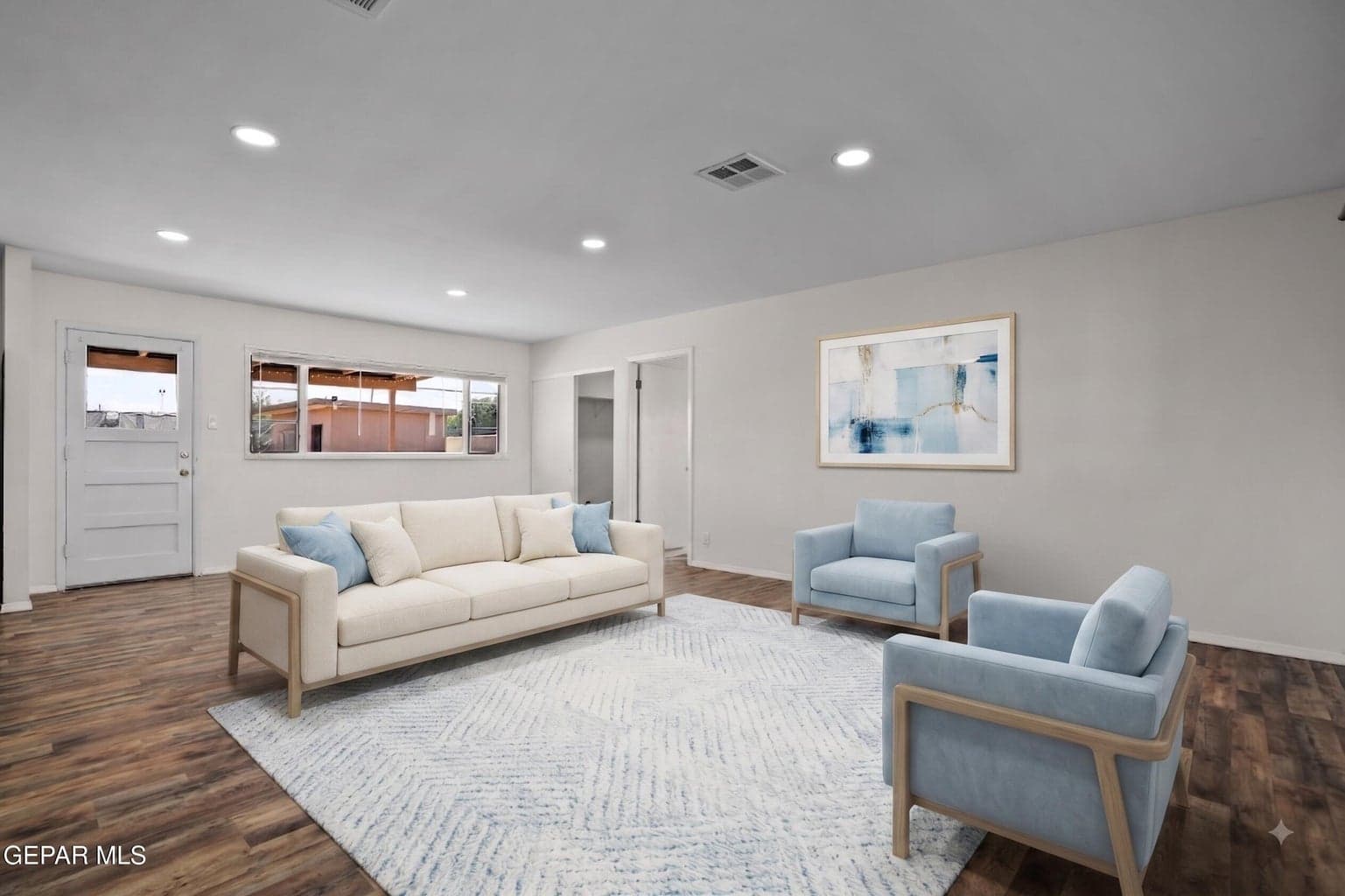 Features laminate flooring and an open layout