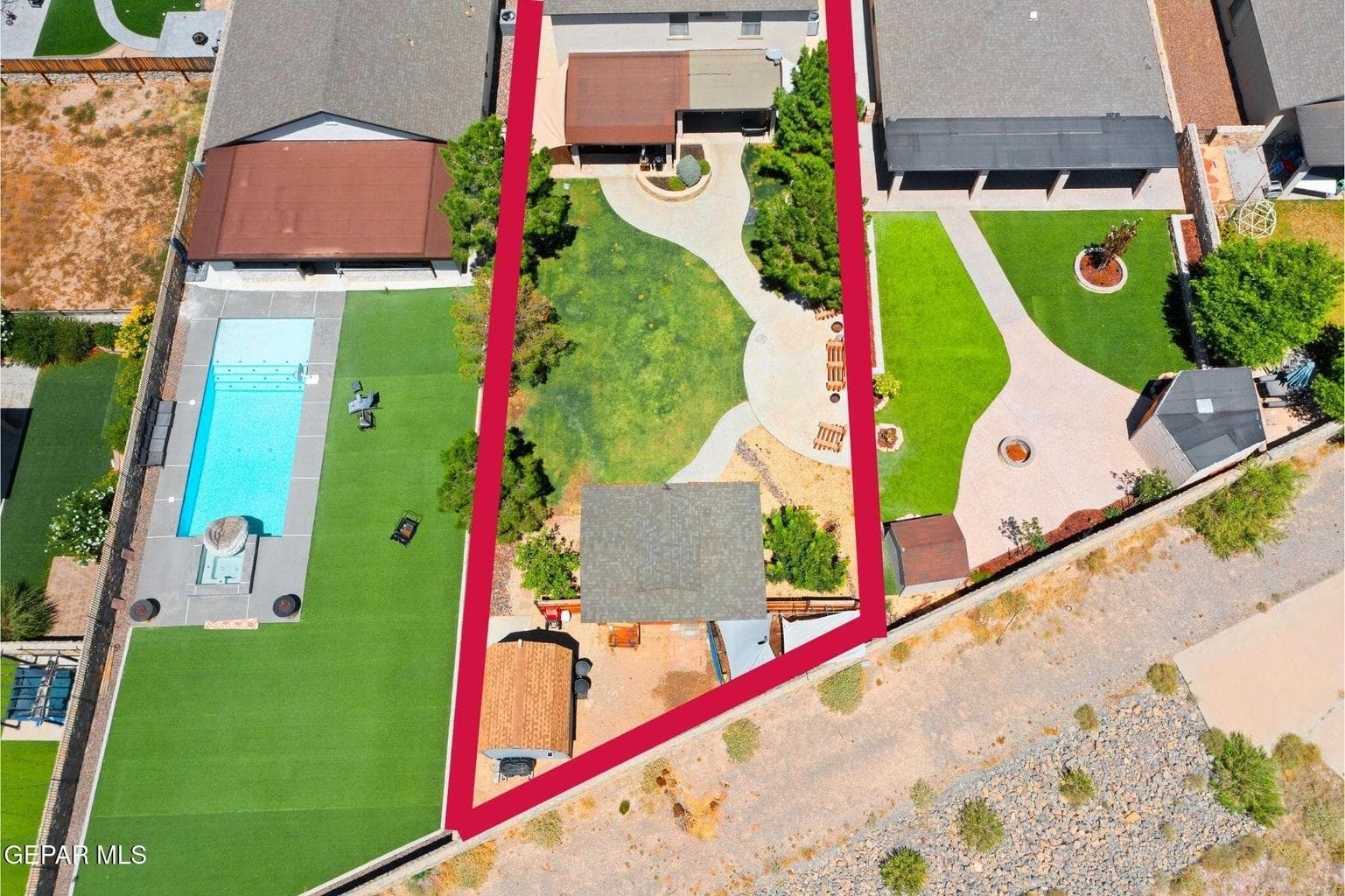 Oversized .2 acre lot with a fully landscaped backyard a permanent structure to relax in!