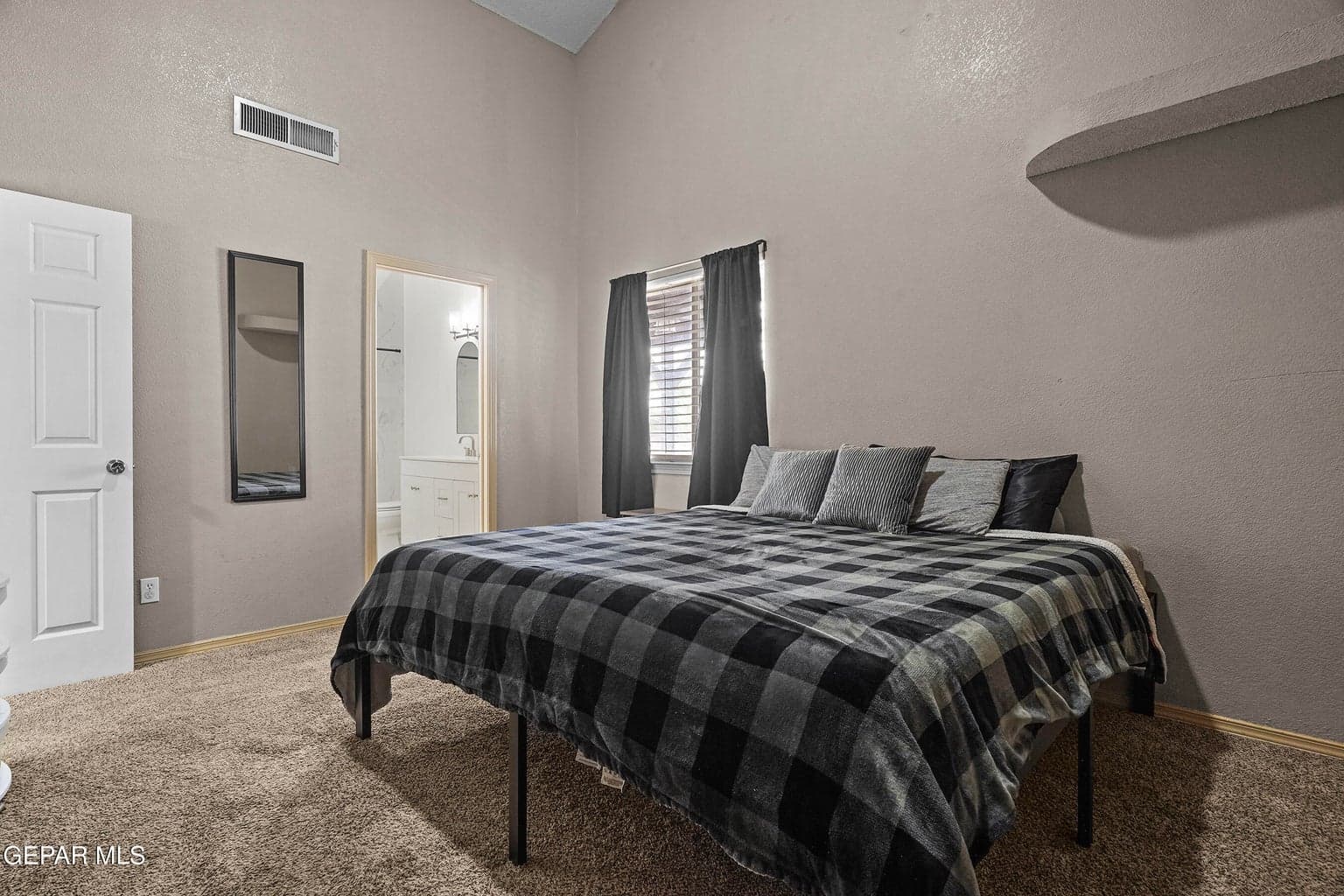 A comfortable retreat with carpet flooring