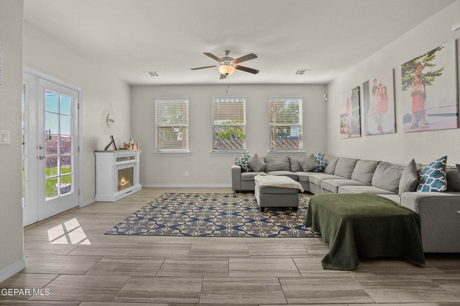 A generous gathering space conveniently located near the kitchen and dining area
