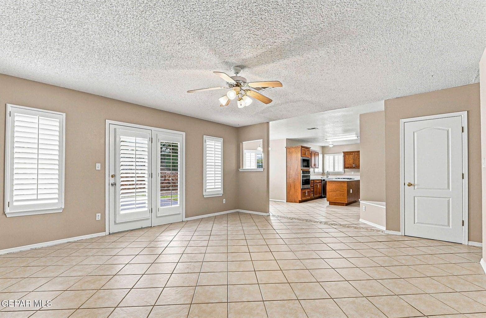 view from the back of family room into the kitchen