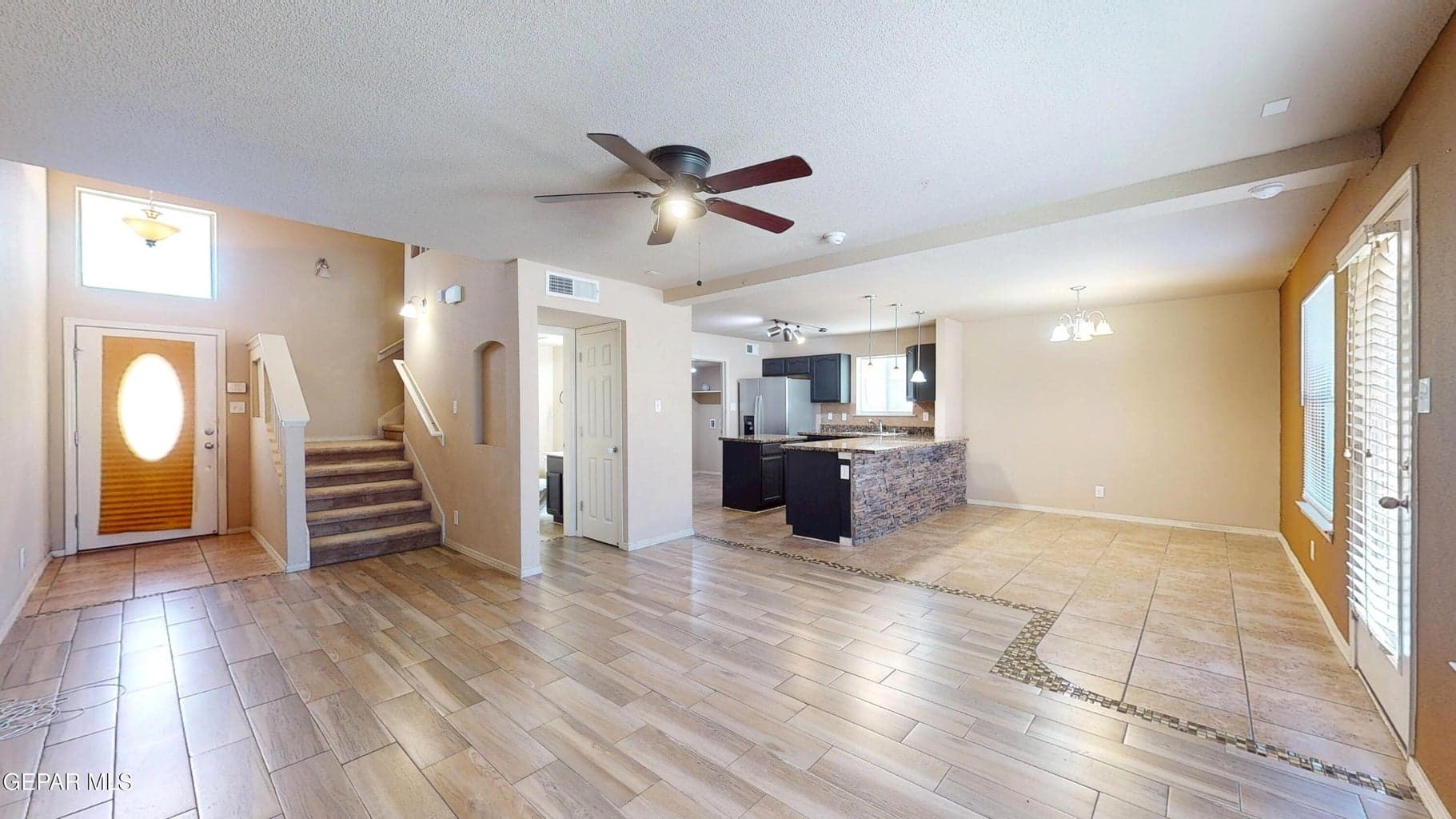 Easy maintenance tiled flooring downstairs.