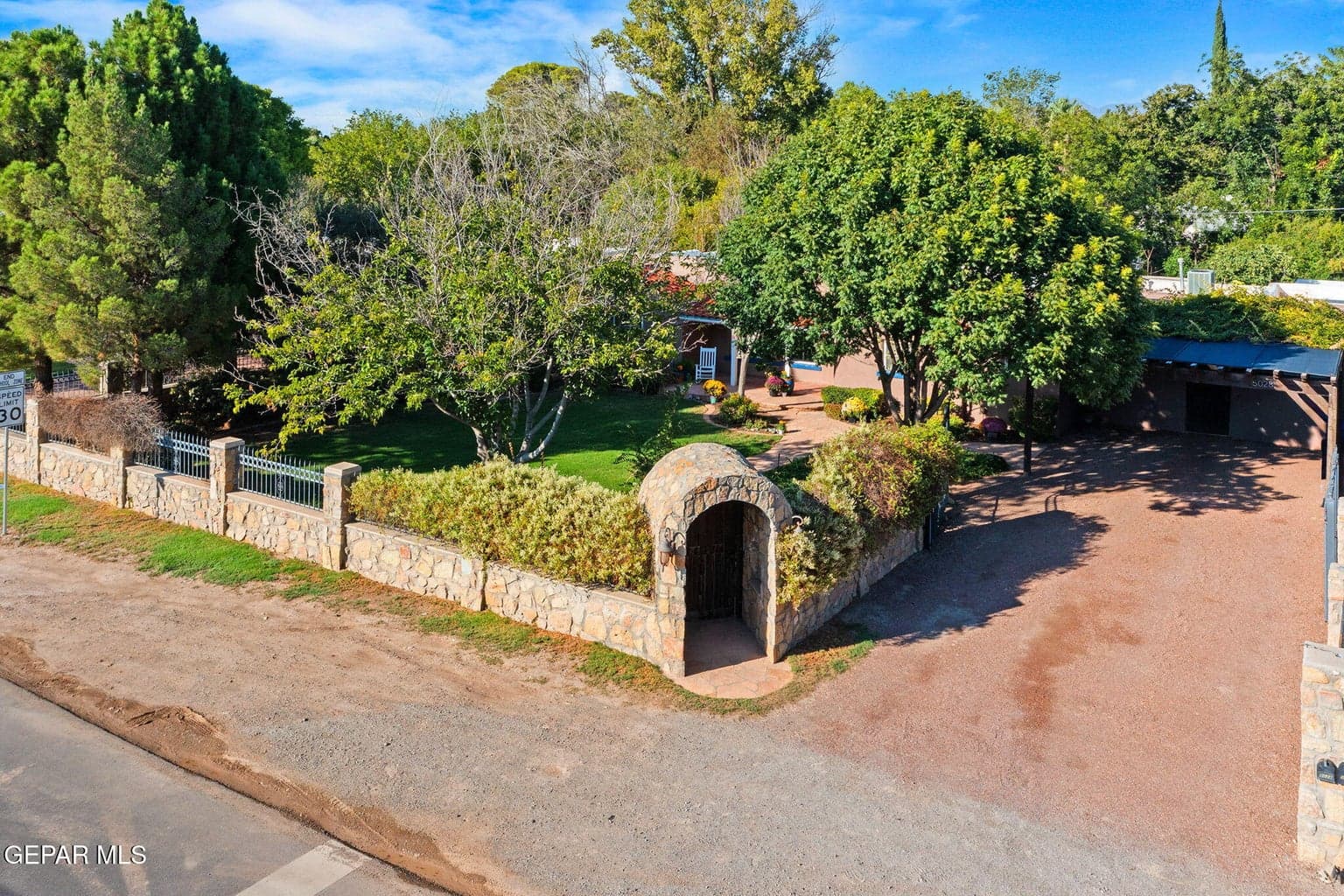 The gated front yard is lovely