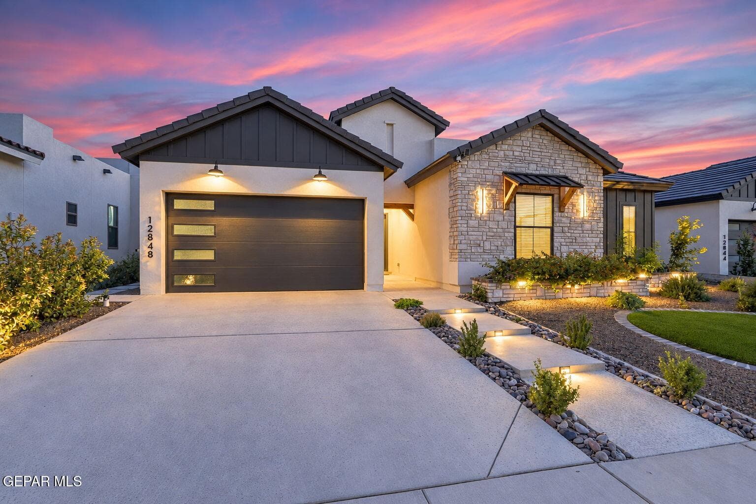 Custom lighting added to exterior and walk way.