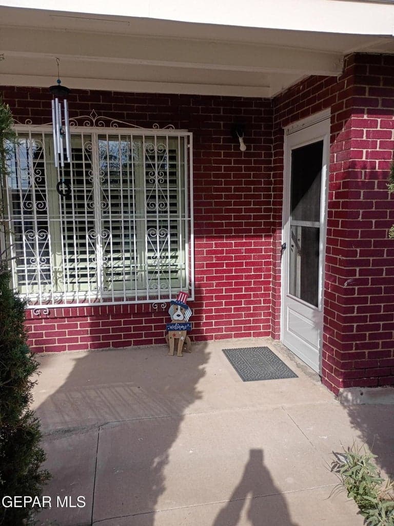 Front entry to property. You can see the wrought Irons for security .