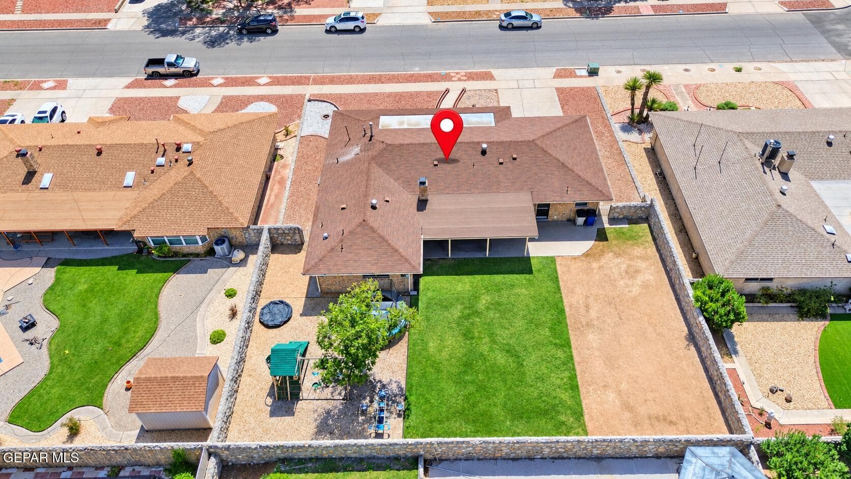 11,040 sq ft lot . 11,040 sq ft lot !! Divided into Playground, Grass area, and bare ground for pool or tennis court