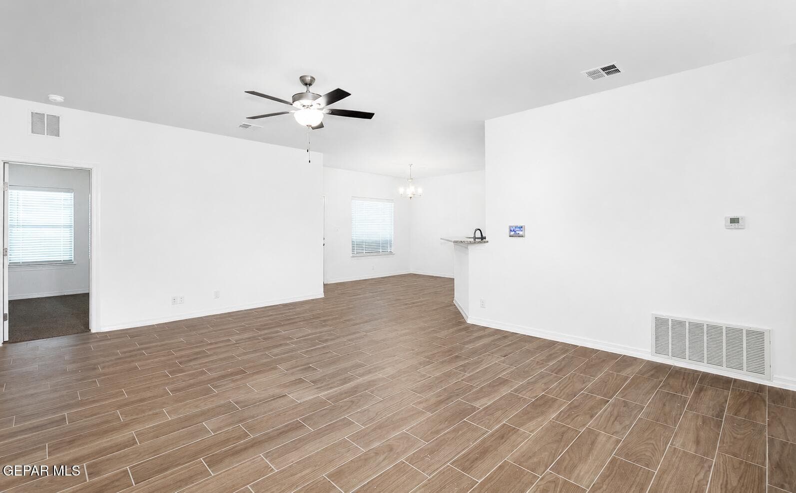 Living room flows into dining areas