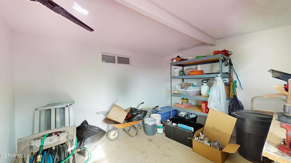 Exterior stucco storage shed on concrete